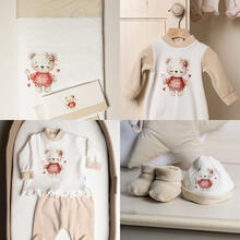 TUTINA NEONATA IN CINIGLIA 